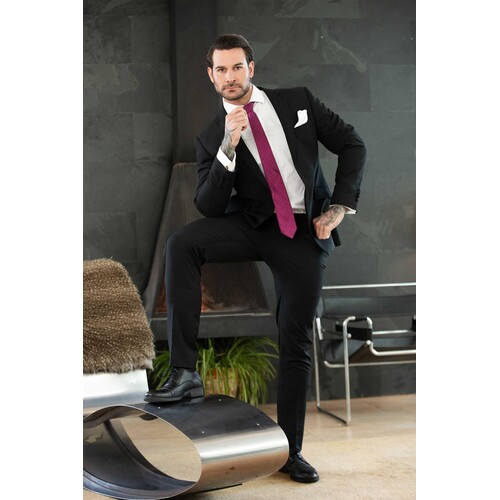 Male posed wearing suit