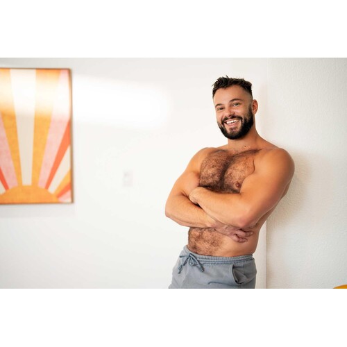 Male posed topless displaying abs