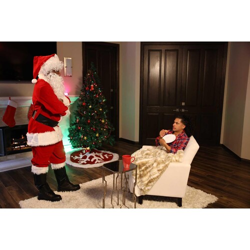 Sant Claus adressing seated male
