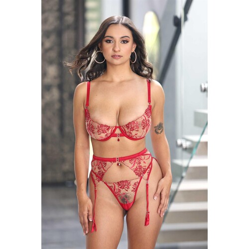 Blonde female posed wearing lingerie displaying cleavage